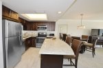 Kitchen With Custom Cabinets & Recessed Lighting